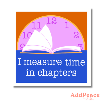Clock with an open book design and text &