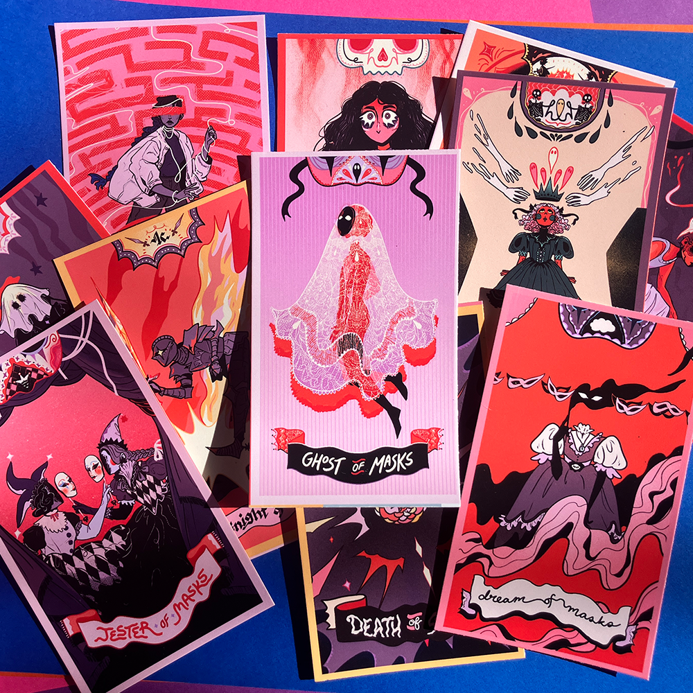 A fan arrangement of illustrated art cards featuring dark gothic and horror-themed designs, including a central pink card titled &