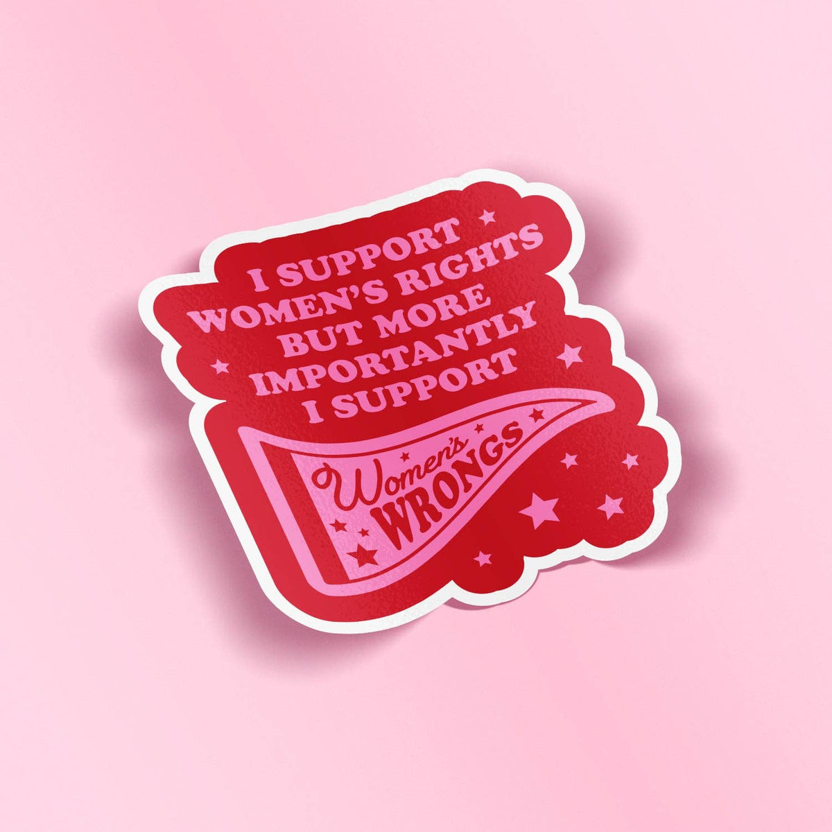 A red die-cut sticker with a white border featuring the text &