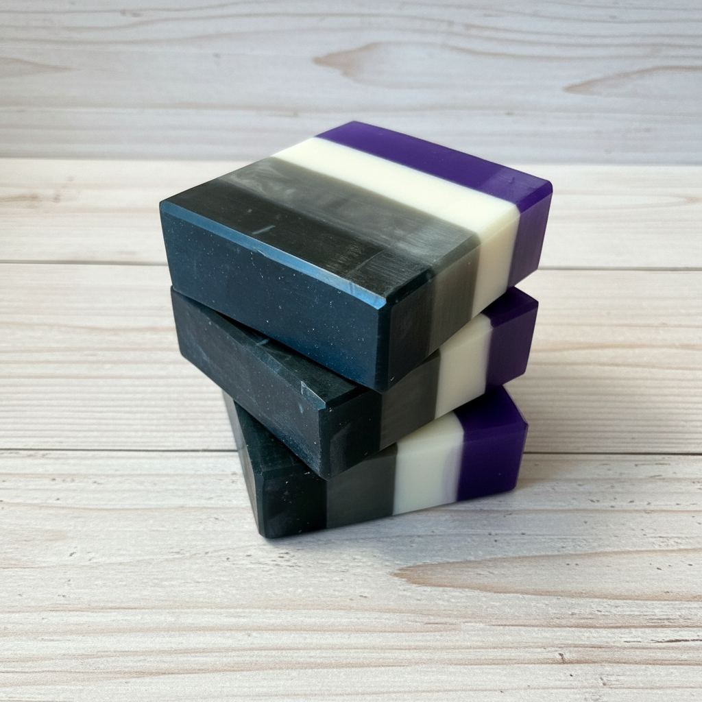 Stack of ace flag soap bars on a wooden surface