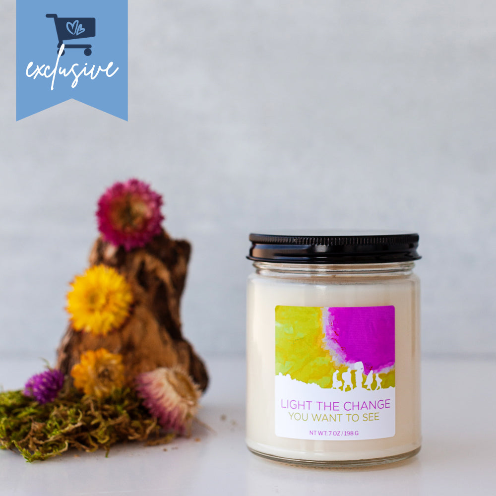 Light the Change handmade soy wax candle with oakmoss sage and citrus — small batch natural candle, woman-owned, immigrant daughter, activist gift, no synthetic fragrance, handmade in California, exclusive to Little Blue Market  "Immigrant daughter" is a powerful keyword addition here that speaks directly t