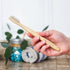 Brush with Bamboo Bamboo Toothbrush - Adult Size in Hand