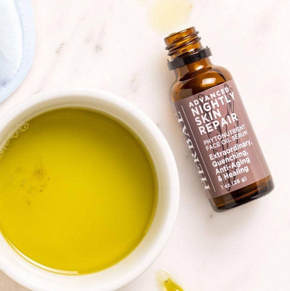 Advanced Nightly Skin Repair Face Oil Serum Indoor Texture Lifestyle 1oz Bottle