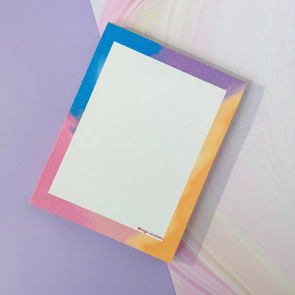 Afterglow notepad detail — blue to purple gradient border close up by indie artist MangoIllustrated