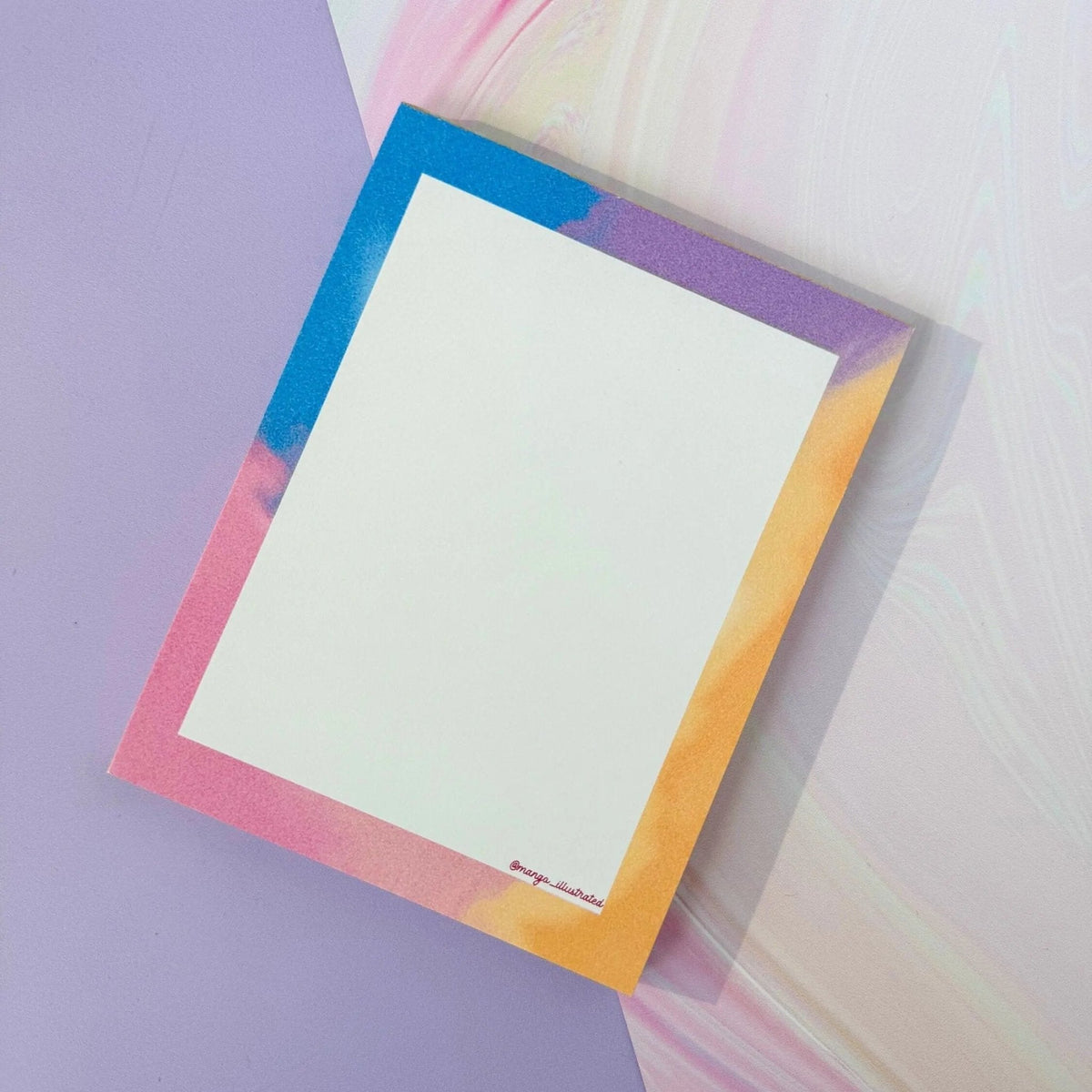 Afterglow notepad detail — pink and orange golden hour gradient edge by indie artist MangoIllustrated