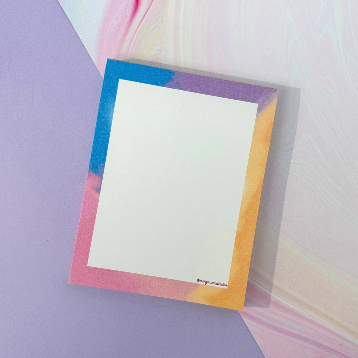 Afterglow notepad flat lay — 4 x 5.5 inch gummed note pad styled on a desk by indie artist MangoIllustrated