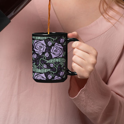 Person being poured coffee into anti-Trump hidden message mug with dark botanical rose print