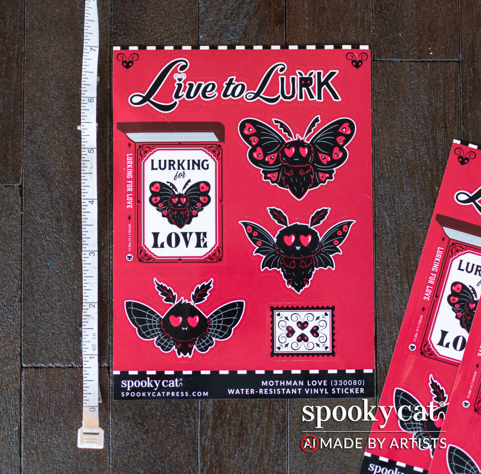 A red sheet of vinyl stickers featuring gothic moth and butterfly designs with hearts, labeled &