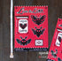A red sheet of vinyl stickers featuring gothic moth and butterfly designs with hearts, labeled &