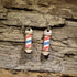 Hand-painted wooden barber pole dangle earrings featuring the iconic red, white, and blue barber pole design. Crafted from lightweight wood with hypoallergenic .925 sterling silver hooks, these fun barber earrings are perfect for barbers, hairstylists, cosmetologists, beauty school students, salon owners, and anyone who loves unique profession-inspired jewelry.