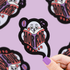 Sticker of a ghost reading &
