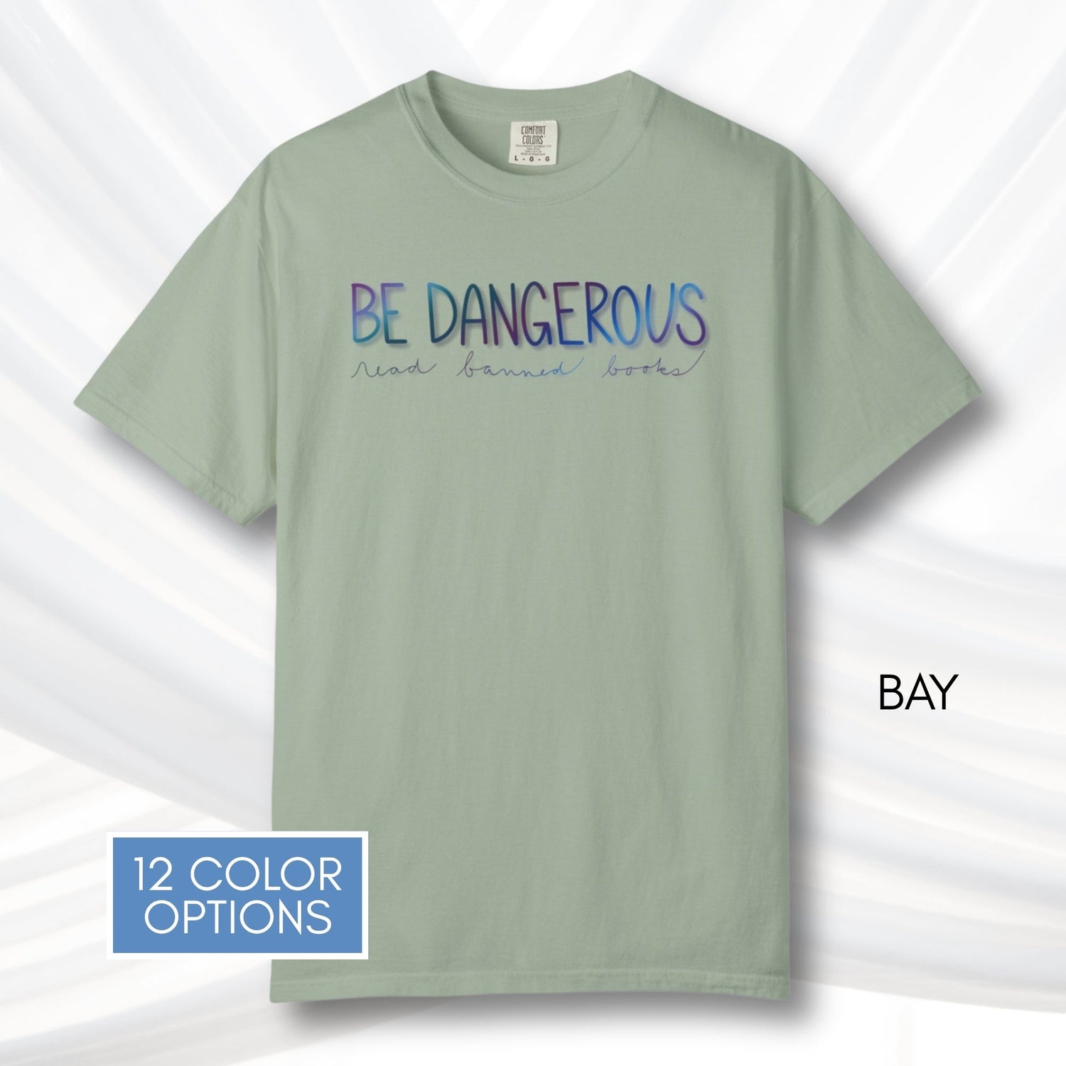be-dangerous-read-banned-books-unisex-tshirt-colorful-literary-graphic-tee-bookish-apparel-comfort-colors-bay