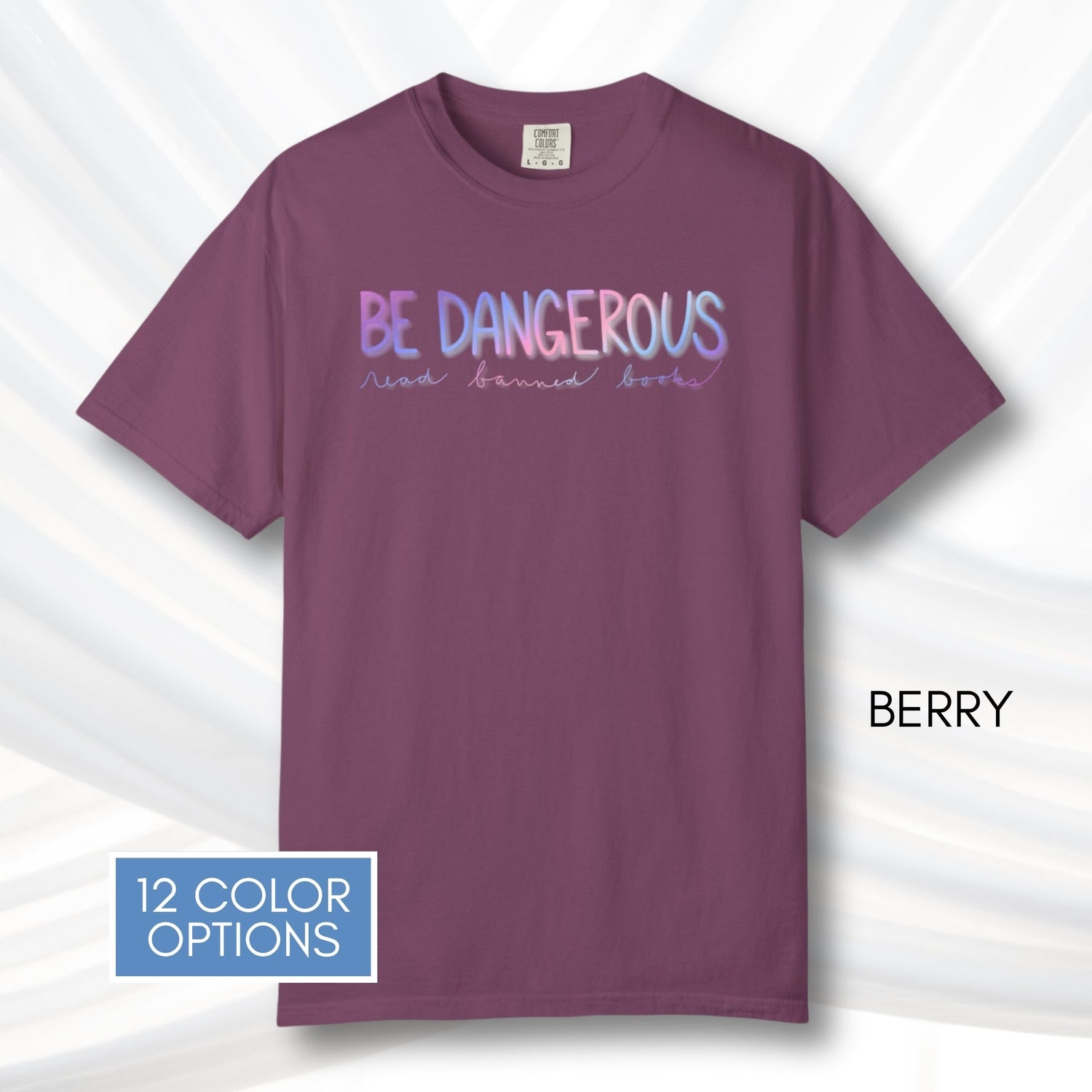 be-dangerous-read-banned-books-unisex-tshirt-colorful-literary-graphic-tee-bookish-apparel-comfort-colors-berry