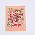 A folded greeting card with a floral design and the phrase &