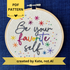 PDF Pattern created by Kate, not AI. "Be Your Favorite Self" is hand embroidered in a script font on cream fabric. Favorite is sewn in rainbow colors, be your and self are embroidered in dark gray, and stars surround the quote. This wall art is framed in a light wood embroidery frame.