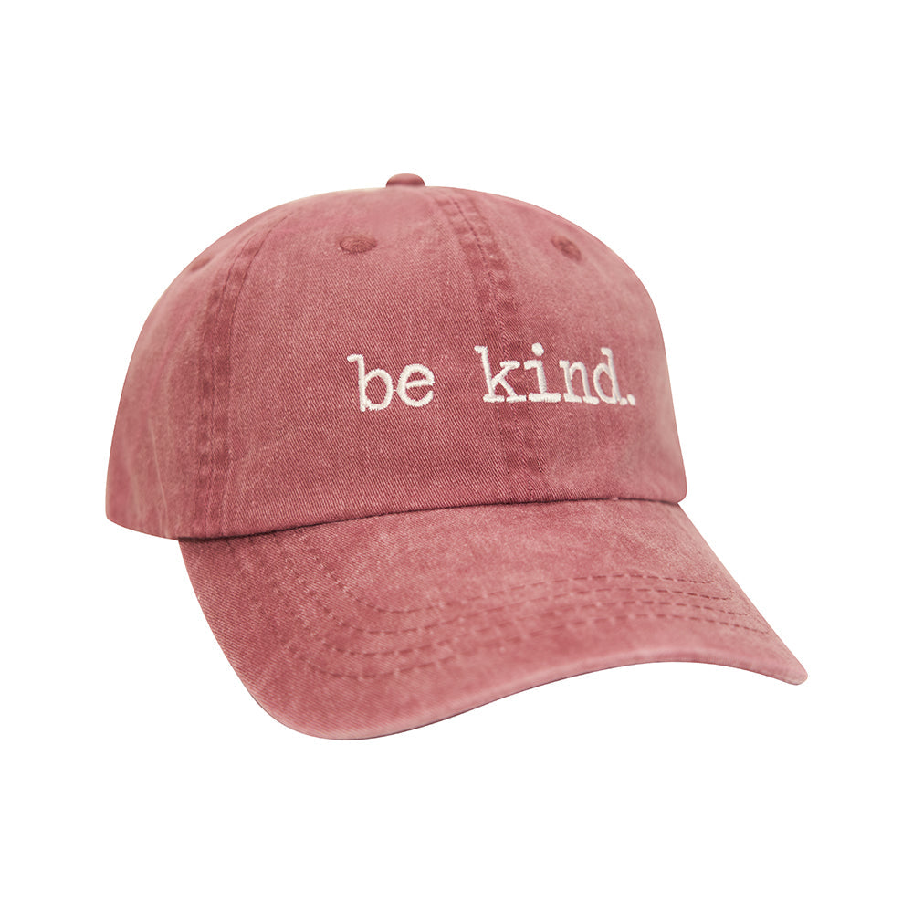 Faded rose cotton dad hat with white "be kind." embroidery and a softly worn, casual style