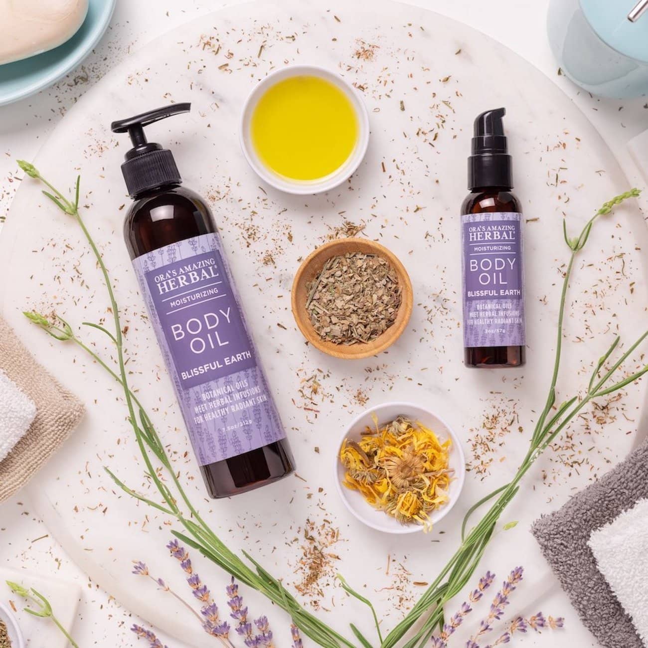 Blissful Earth Body Oil Indoor Texture Lifestyle 2oz &amp; 7.5oz Bottles