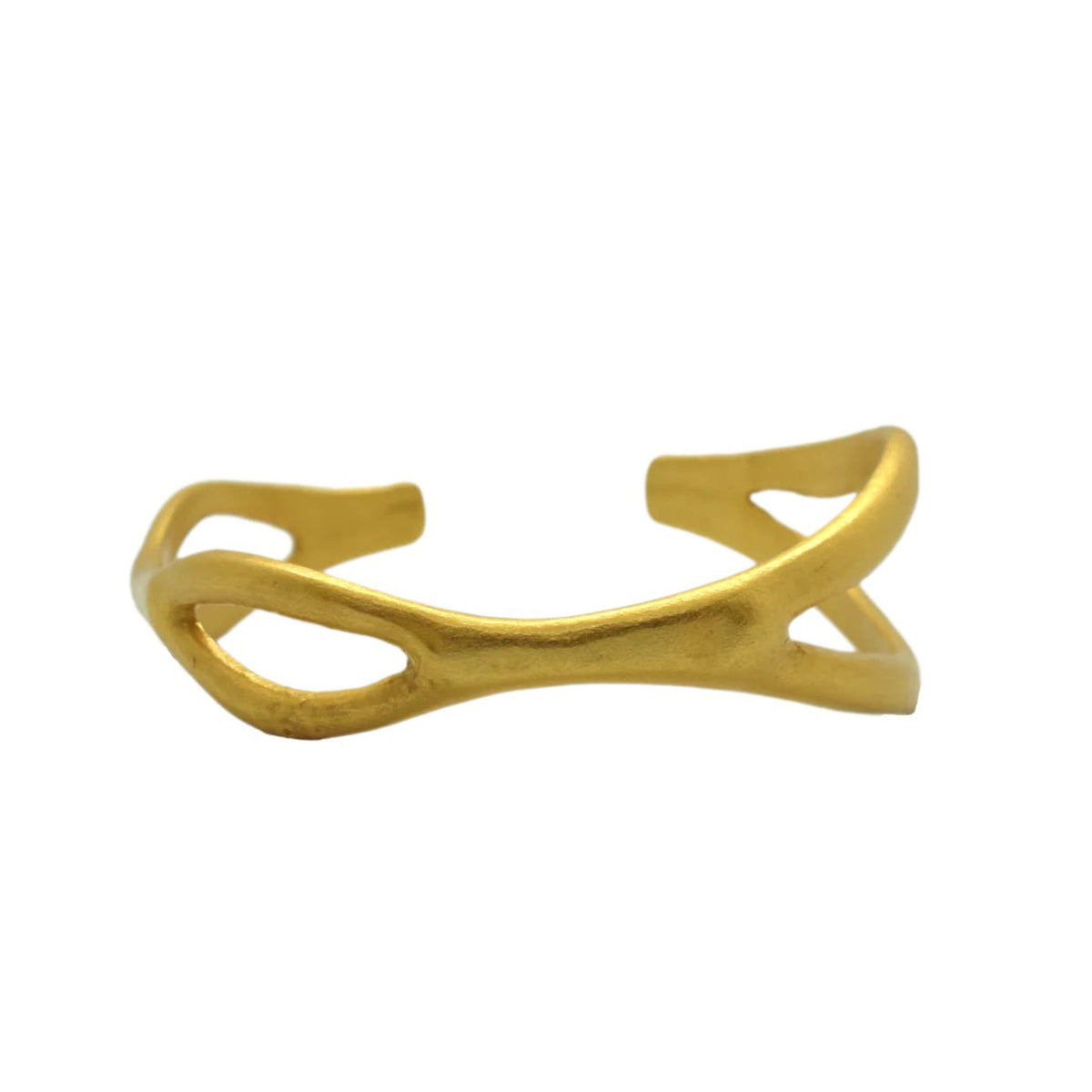 Guaranda handmade sculptural bangle bracelet in gold-plated brass, by Vattea Colombia, fair trade artisan jewelry, flat lay