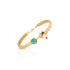 ethically handmade gold filigree cuff bracelet with assorted stones laid organically and a conch shell, luxury fair trade jewelry in chicago 
