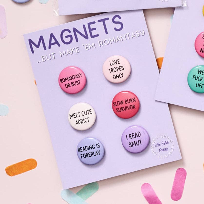 Set of colorful buttons on a card labeled &