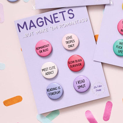 Set of colorful buttons on a card labeled &