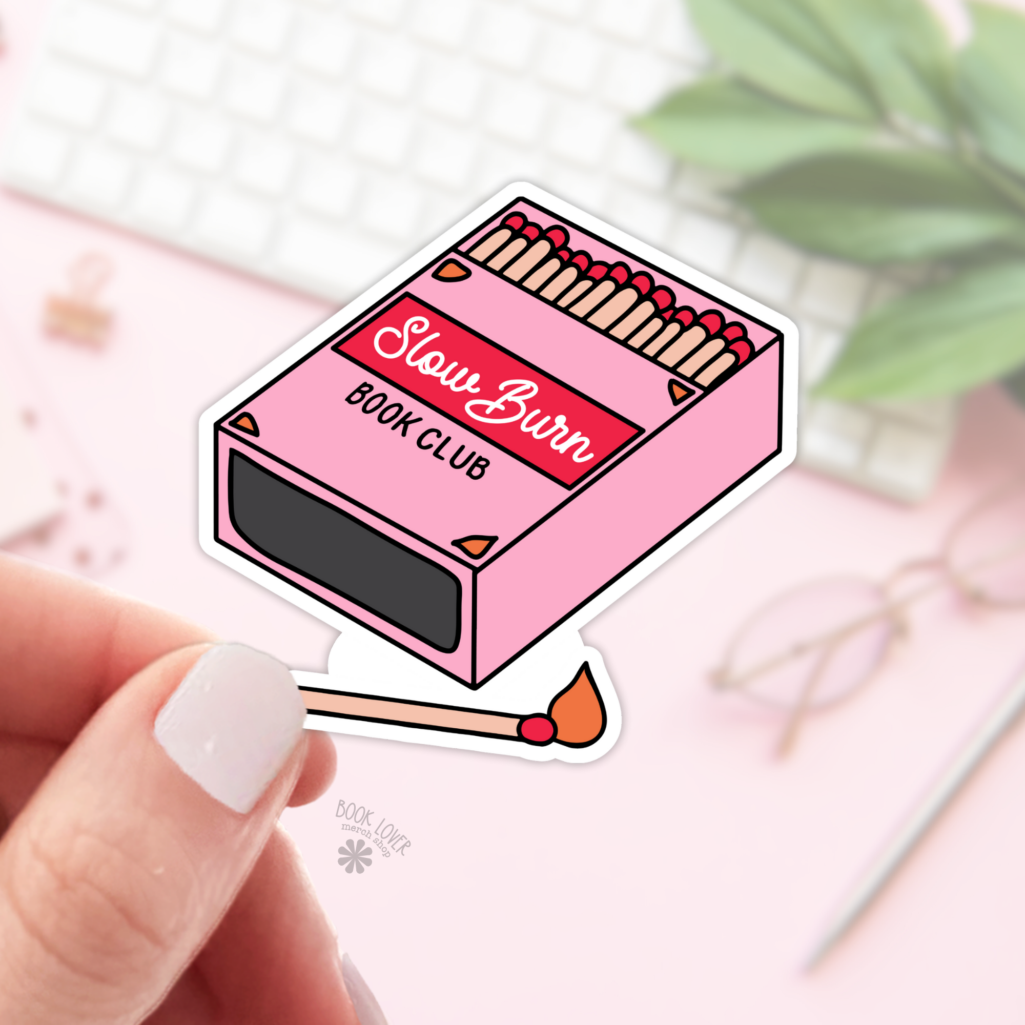 Sticker of a pink matchbox with &