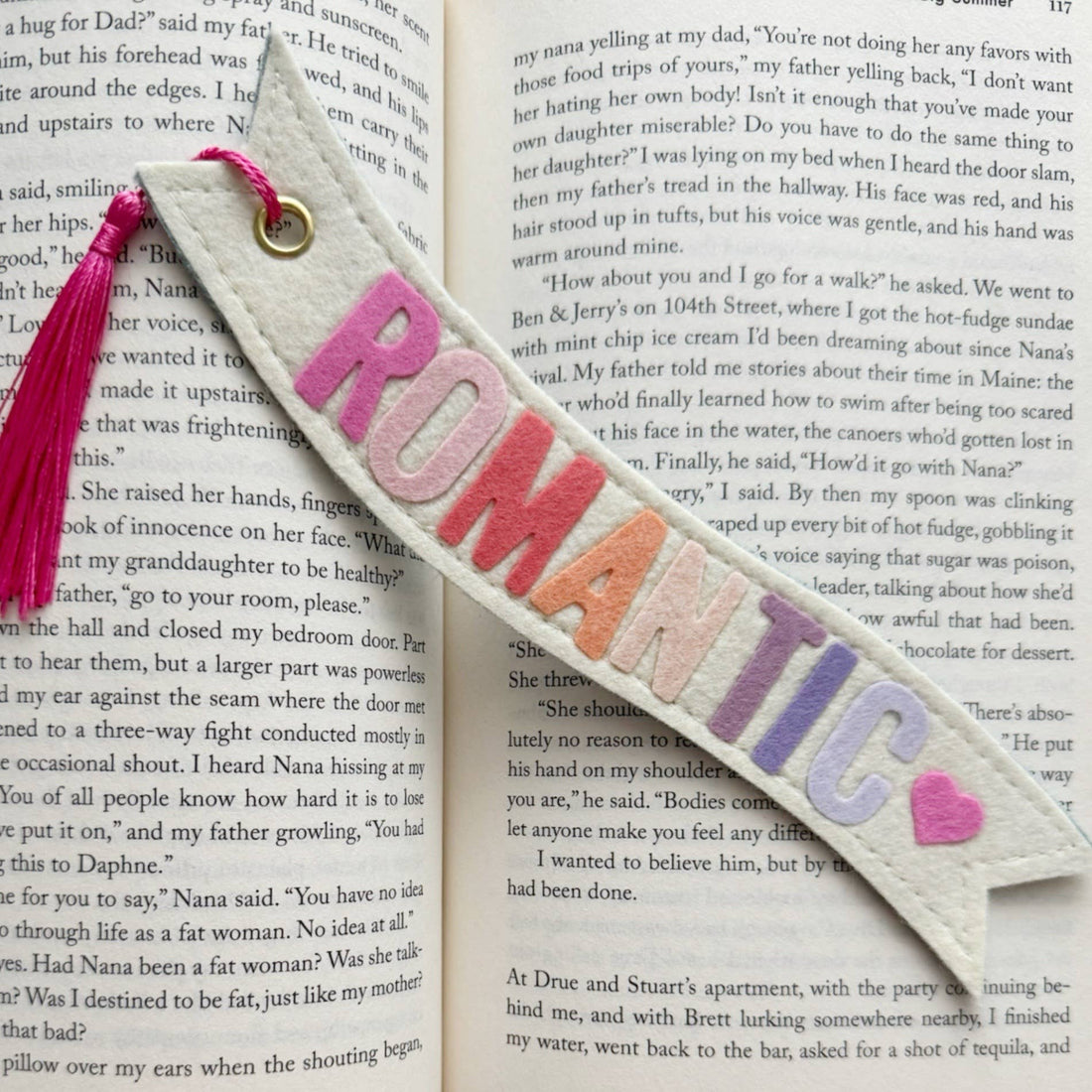 Textured bookmark with colorful letters spelling &
