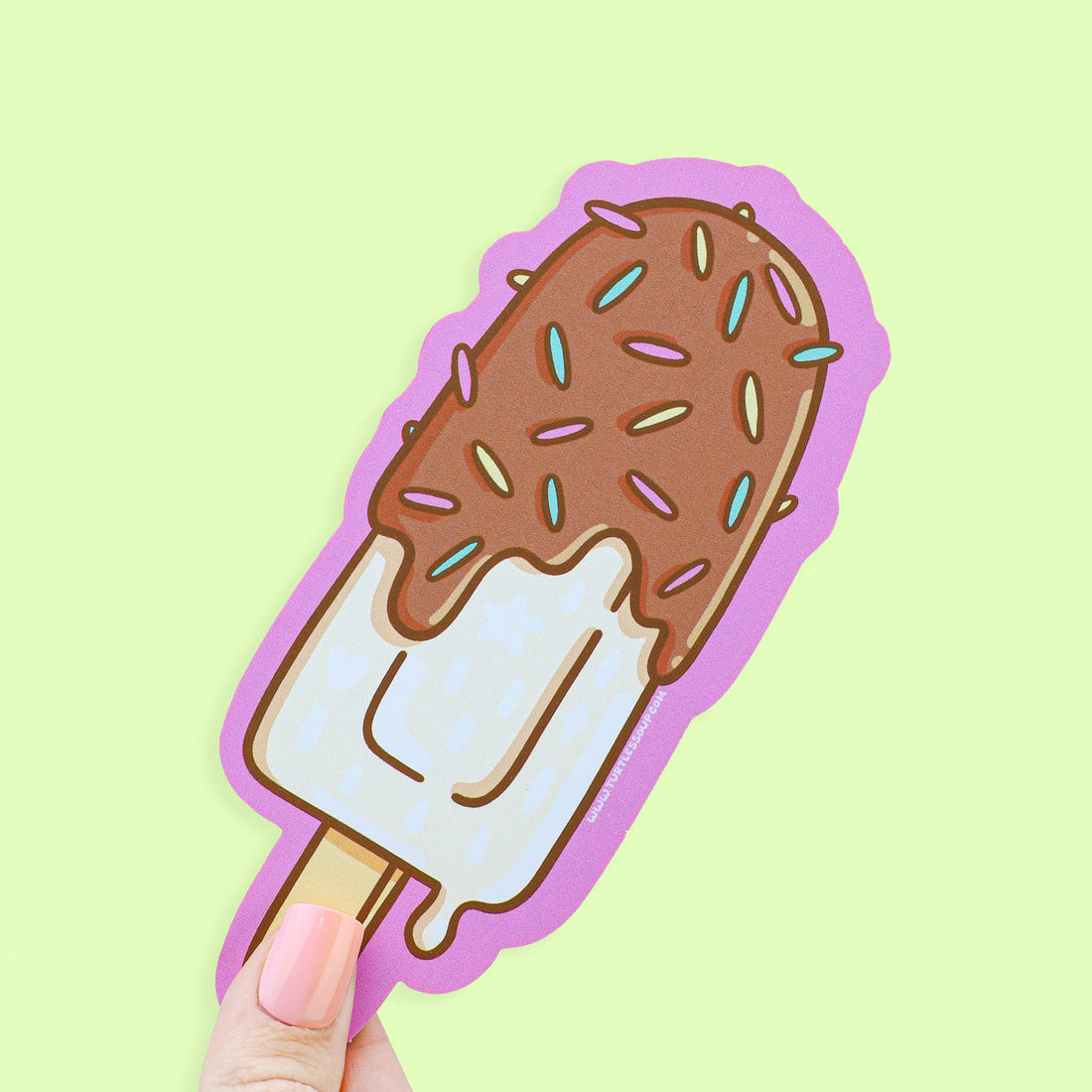 Illustration of a chocolate-covered ice cream pop with sprinkles on a light green background