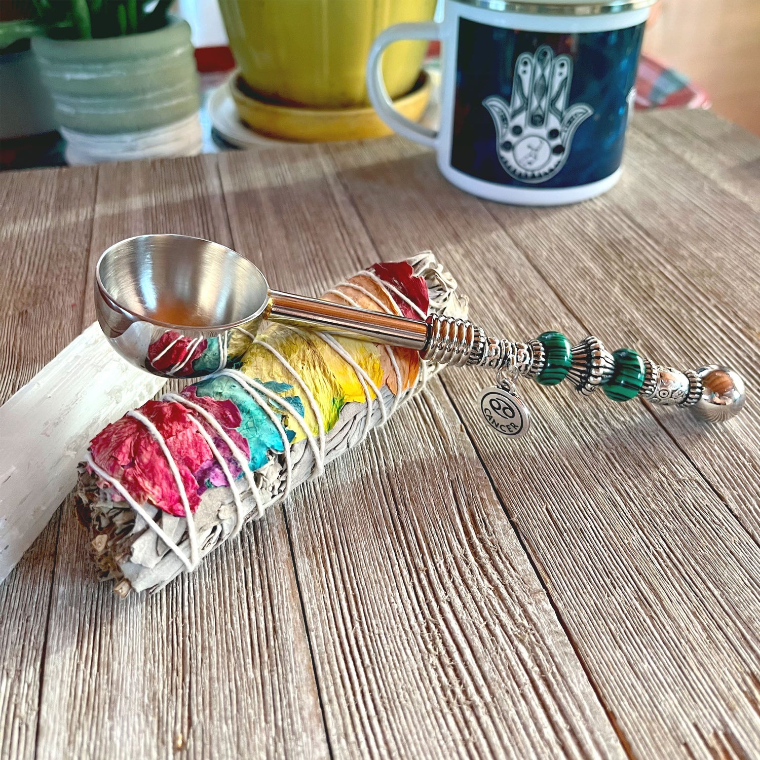 Astro Bowl Spoon featuring an enchanting zodiac charm and a focus stone handle, perfect for tea lovers.