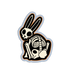 Sticker with skeleton rabbit design on a white background