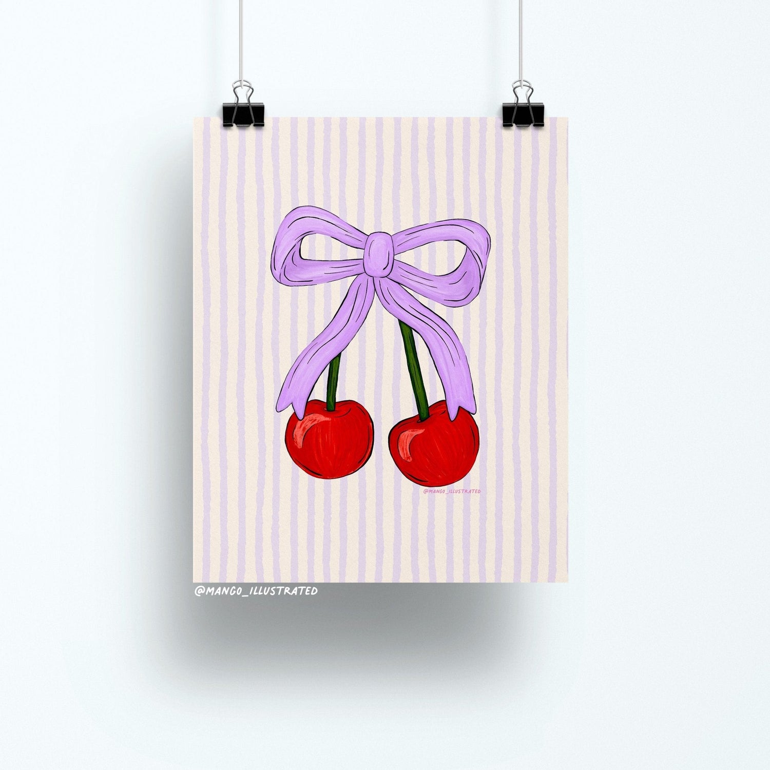 8x10 art print of two red cherries tied together with a lavender bow on a pastel vertical striped background