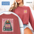 christmas-book-tree-unisex-long-sleeve-tee-holiday-activism-shirt-literary-activist-top-reader-gift-comfort-colors-crimson