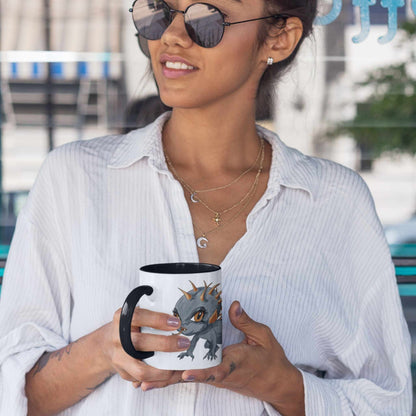 Woman in sunglasses holding the cute Chupacabra cryptid coffee mug outdoors