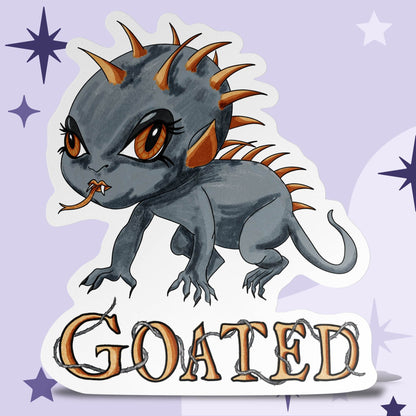 Chibi chupacabra sticker with amber eyes and rust-orange spikes above bramble-tangled GOATED lettering on a lavender starry background