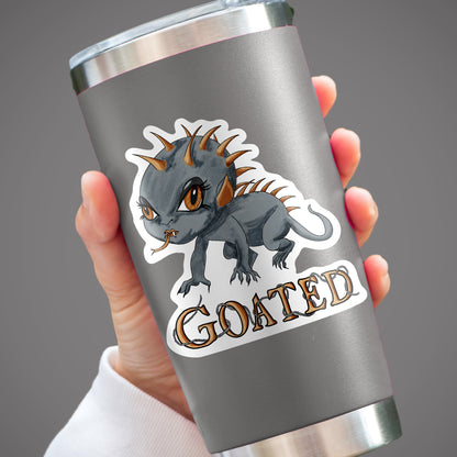 Chibi chupacabra cryptid sticker on a gray insulated tumbler held in one hand