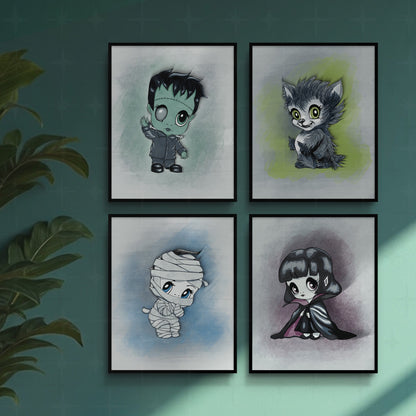 Classic monster art print set hung as a two by two gallery grid in black frames on a deep teal wall beside a leafy houseplant.