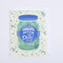 A folded greeting card with a colorful illustration of a pickle jar and the text &