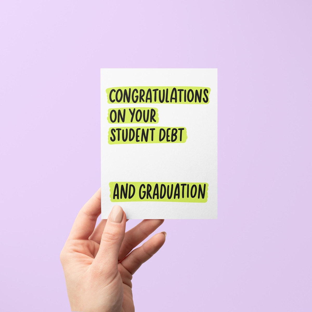 Congratulations on your student debt graduation card flat lay — sarcastic student loan graduation card by indie artist MangoIllustrated