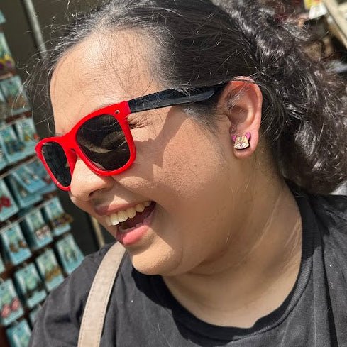 Person wearing hand-painted Corgi butt wooden stud earring, showing the lightweight size and fit when worn. Cute dog jewelry featuring a heart-shaped Corgi rear, perfect for Corgi owners, dog lovers, and Welsh Corgi enthusiasts.