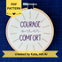 PDF pattern created by Kate, not AI. "Courage over comfort". "courage" and "comfort" are hand embroidered in dark purple embroidery thread and are all capital letters in a print handwriting font. "over" is stitched in light purple embroidery floss in a lowercase cursive handwriting font. Quote is centered in a burst of metallic gold rays. Fabric is white cotton. Framed in light wood embroidery hoop as wall art or Christmas ornament.