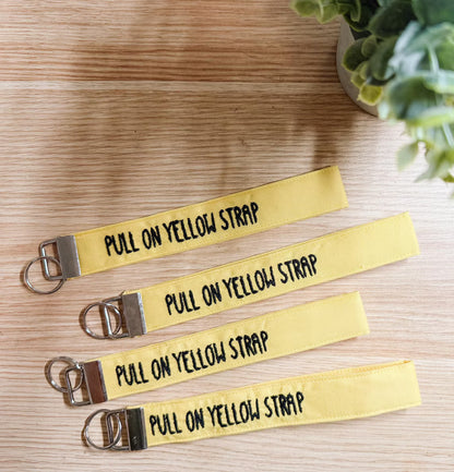 Pull on Yellow Strap Embroidered Wristlet | Handmade Disney Theme Park-Inspired Keychain