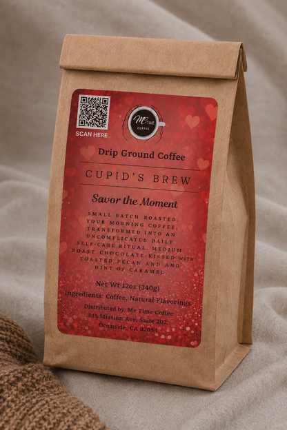 A kraft paper coffee bag standing upright on a neutral fabric surface. The bag has a large red label reading &