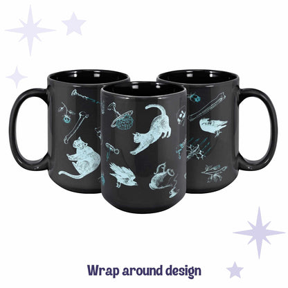 Three black ceramic mugs arranged to show the full wrap around neon cyan zombie icons pattern