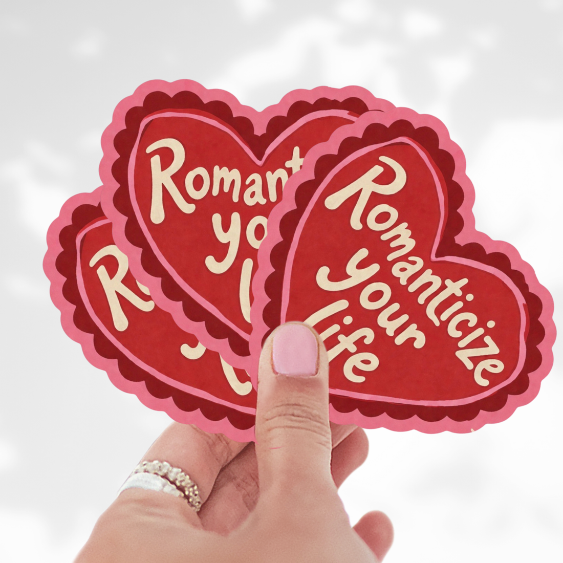 Heart-shaped stickers with &