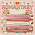 Set of pens with humorous quotes on a decorative card with floral designs.