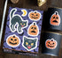 Vintage Halloween vinyl sticker sheet and matching candle decals featuring a black spookier cat and orange jack-o&