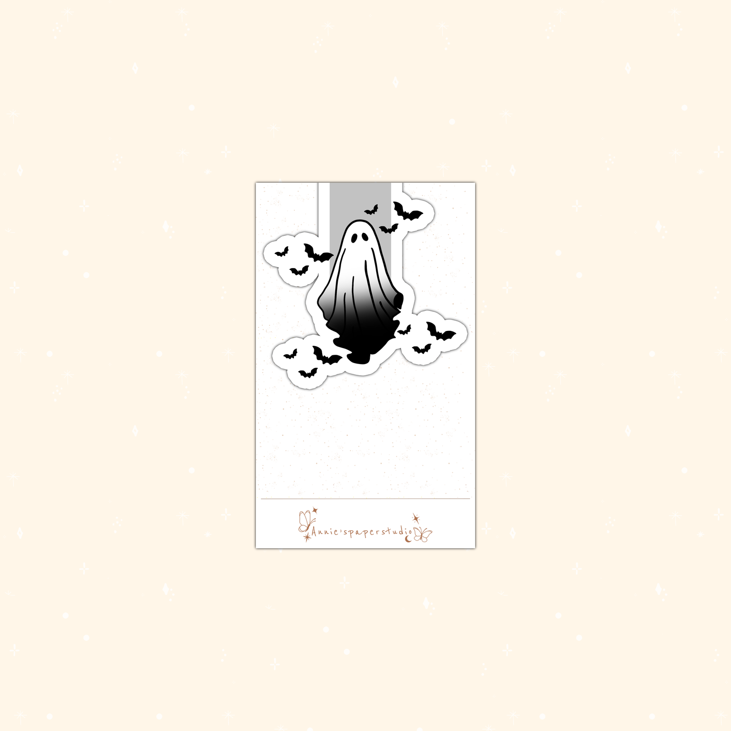A Halloween-themed magnetic bookmark featuring a black and white dripping ghost surrounded by bats, presented on a white backing card with a small brand logo at the bottom.