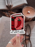 Sticker of a book with a chili pepper and &