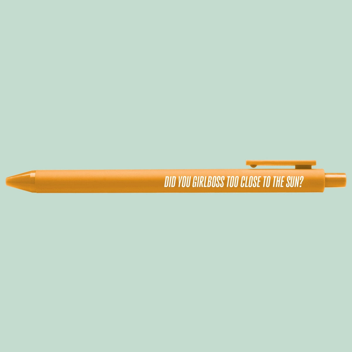 Did You Girlboss Too Close to the Sun pen flat lay — funny orange office gel pen by indie artist MangoIllustrated
