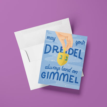 Greeting card with a dreidel illustration and text on a purple background
